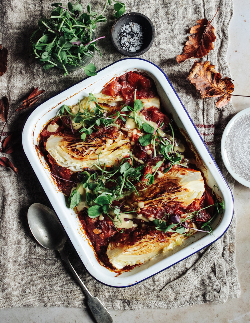 baked-hispi-cabbage-in-smokey-tomatoes-and-tahini 1