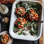 Baked mushrooms with harissa chickpeas & tahini dressing