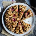 Banana, almond and raspberry cake with granola topping
