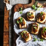 Cheesy toasts with caramelised balsamic onions