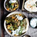 Herby spinach lentil stew with broccoli steaks and spelt flatbreads