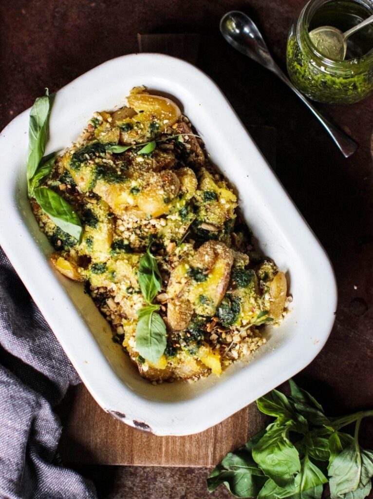 Crushed potatoes with spinach & basil pesto & cashew parmesan