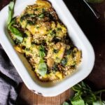 Crushed potatoes with spinach & basil pesto & cashew 'parmesan'