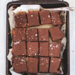 Indulgent caramel millionaires shortbread slices with ombar chocolate (gluten free)