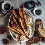 Miso roast parsnips on mustard butter bean mash & roast garlic