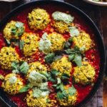Moroccan 'fish' balls with tomato sauce and freekeh salad