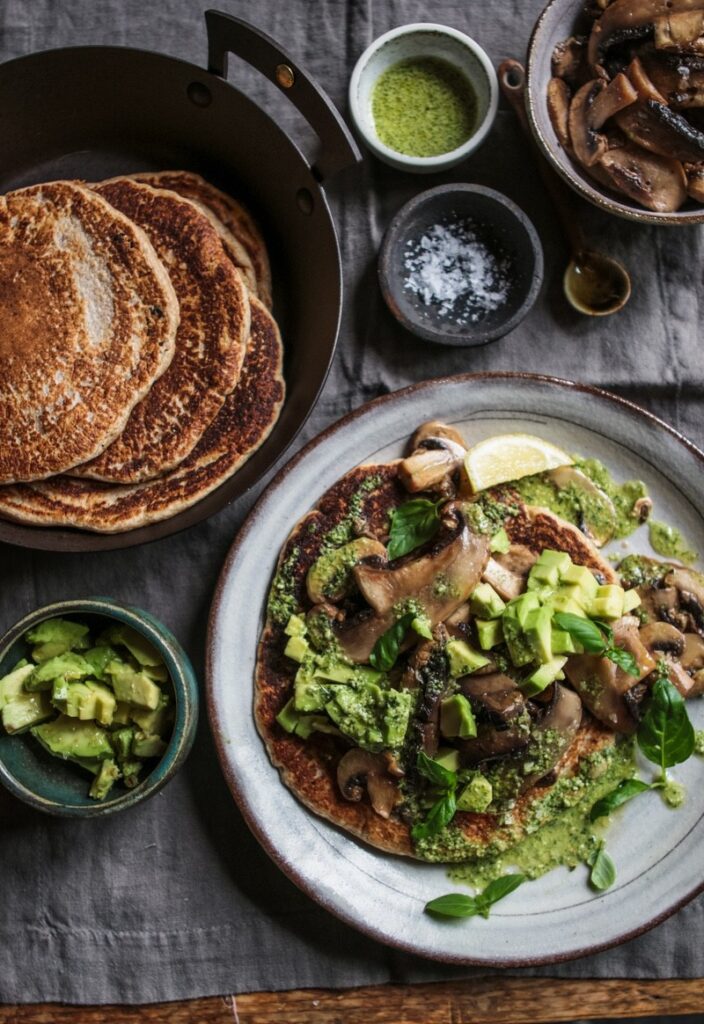 Oaty pancakes with avocado and mushrooms