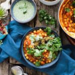 Organic feed your happy – tomato & chickpea curry with potato & pea cakes