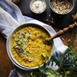 Red lentil and coconut dal with toasted sunflower seeds