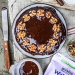 Rich chocolate walnut cake with ganache topping