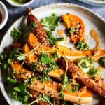 Roast squash & carrots with peanut dressing & zingy herbs