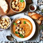 Spiced sweet potato & carrot soup with crispy tofu & toasted hazelnuts