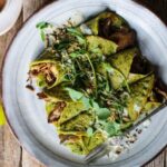 Spinach crêpes with mushrooms, basil pesto & tahini dressing
