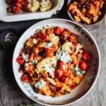 Sticky aubergine & courgette puttanesca with roast cauliflower