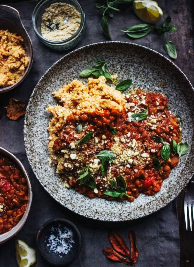 The best lentil bolognese with roast veg mash and cashew parmesan