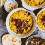 Creamy coconut dal with tarka and mini flatbreads