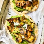 Roasted courgette & white miso pesto flatbreads with charred courgette