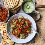 Sticky tamarind squash curry with coriander and mint dressing